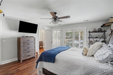 Set on four private acres off coveted Green Island Road, this - photo 15