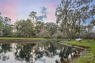 Set on four private acres off coveted Green Island Road, this - photo 34