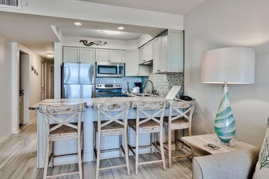 Jetty East is a Gulf front Gated 6-story midrise with under - photo 6