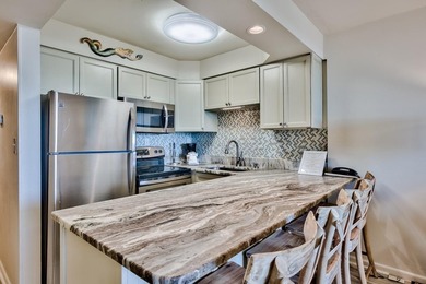 Jetty East is a Gulf front Gated 6-story midrise with under - photo 8