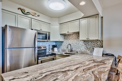 Jetty East is a Gulf front Gated 6-story midrise with under - photo 9