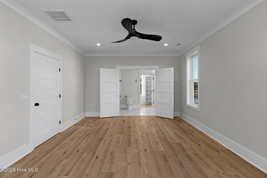 Welcome to this exquisite new construction home by Barefoot