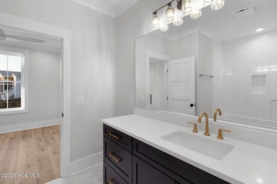 Welcome to this exquisite new construction home by Barefoot