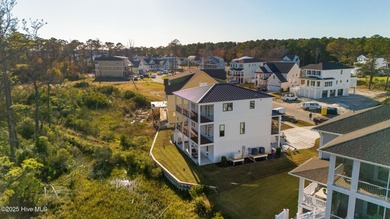 Welcome to this exquisite new construction home by Barefoot