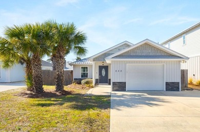 This well-located 3-bedroom, 2-bathroom home on the highly - photo 2