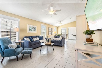 This well-located 3-bedroom, 2-bathroom home on the highly - photo 6