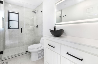 Welcome to this beautifully remodeled home where modern updates - photo 23