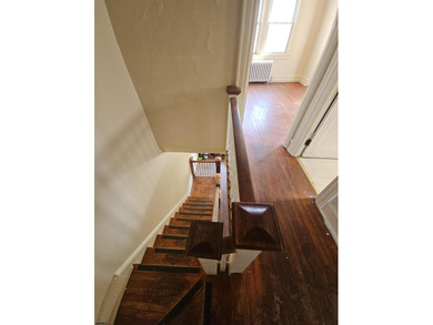 Prime Location with Exceptional Potential! This 3-bedroom - photo 4