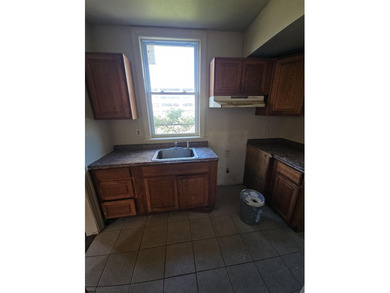 Prime Location with Exceptional Potential! This 3-bedroom - photo 8