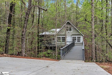 Step into this recently re-built bungalow nestled in the woods - photo 2