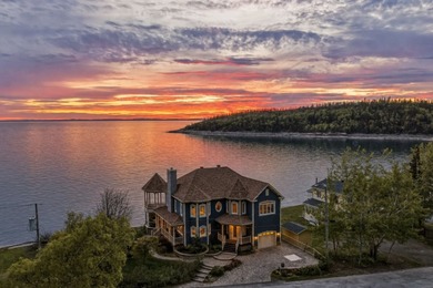 Nichee en bordure du fleuve Saint-Laurent, cette prestigieuse - photo 1