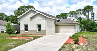 This 2022 3/2/2 home is in great condition & move in ready! The - photo 1