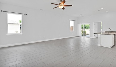 This 2022 3/2/2 home is in great condition & move in ready! The - photo 4
