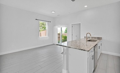 This 2022 3/2/2 home is in great condition & move in ready! The - photo 9