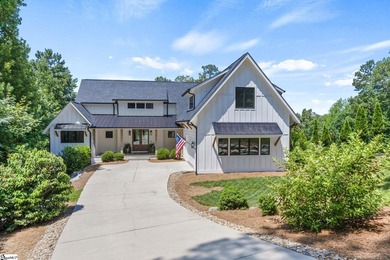 Experience the pinnacle of luxury lakefront living in this - photo 1