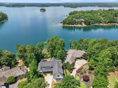 Experience the pinnacle of luxury lakefront living in this - photo 2