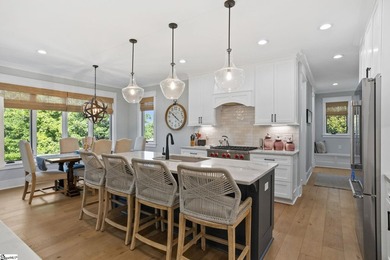 Experience the pinnacle of luxury lakefront living in this - photo 8