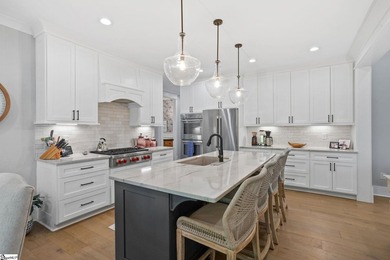 Experience the pinnacle of luxury lakefront living in this - photo 9