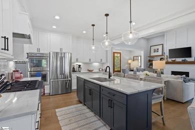 Experience the pinnacle of luxury lakefront living in this - photo 10