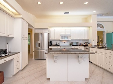 Exceptional lakefront estate in the prestigious River Club at - photo 8