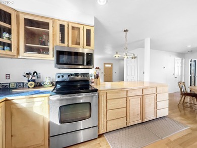 Enjoy coastal living in this spacious and versatile home with - photo 11