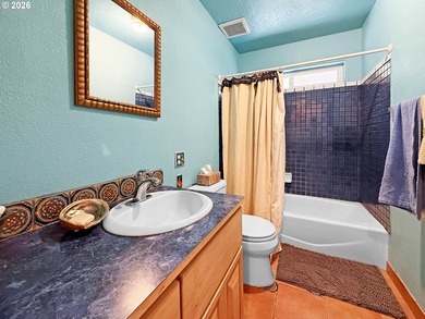 Enjoy coastal living in this spacious and versatile home with - photo 19