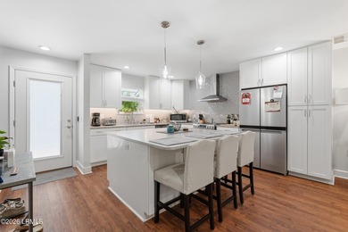 Welcome to your beautifully renovated, low-maintenance oasis in - photo 4