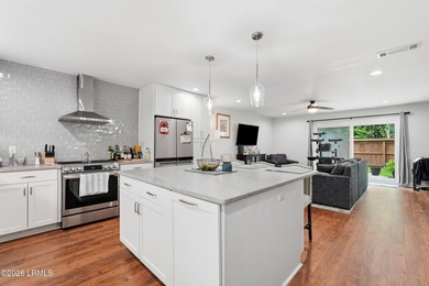 Welcome to your beautifully renovated, low-maintenance oasis in - photo 6