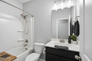 Welcome to a thoughtfully reimagined lagoon front residence - photo 9