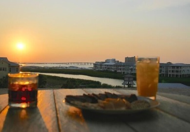 Jetty East is a Gulf front Gated 6-story midrise with under - photo 1
