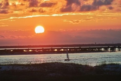Jetty East is a Gulf front Gated 6-story midrise with under - photo 2