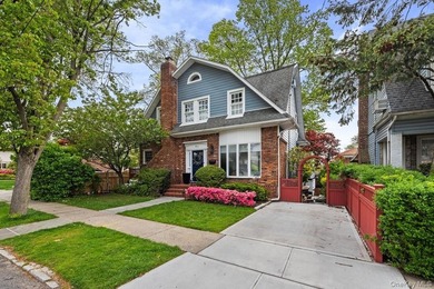 Move right into this beautiful Colonial on a tree-lined block in - photo 1