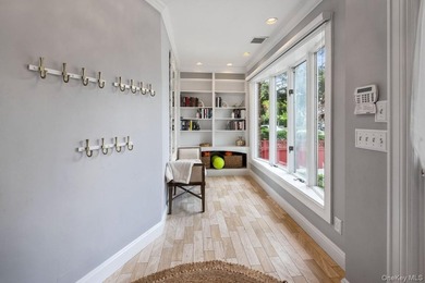 Move right into this beautiful Colonial on a tree-lined block in - photo 2