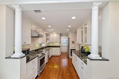 Move right into this beautiful Colonial on a tree-lined block in - photo 8