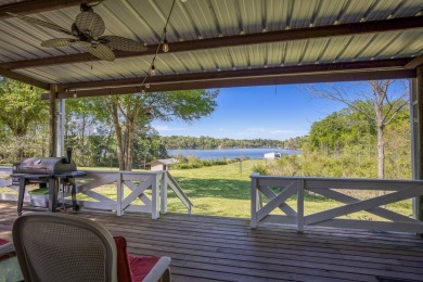 Inviting waterfront home on Lost Prairie Lake! This 4 bedroom 3 - Lake Home For Sale in Palestine, Texas