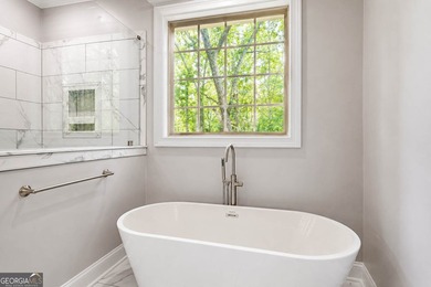 Set well back from the road and surrounded by 36 private acres - photo 31