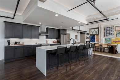 Step into refined downtown living with Unit 600 at The Alston, a
