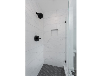 Step into refined downtown living with Unit 600 at The Alston, a