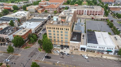 Step into refined downtown living with Unit 600 at The Alston, a