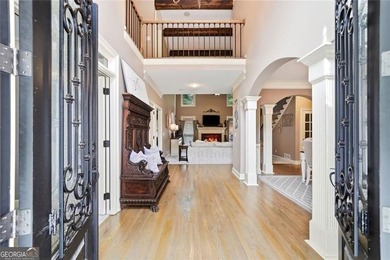Welcome to luxury living in the prestigious Towne Lake Hills - photo 5