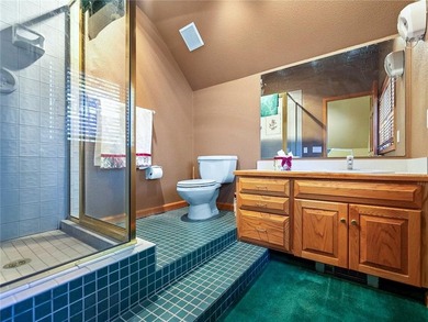 Tucked away on a private, 1.17-acre hilltop lot in the coveted - photo 31