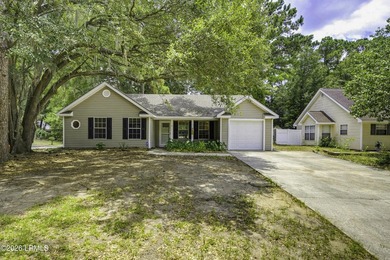 Welcome to 3 Eagle Trace, a charming 3-bedroom, 2-bath home on - photo 1