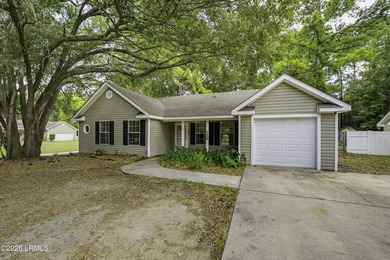 Welcome to 3 Eagle Trace, a charming 3-bedroom, 2-bath home on - photo 2