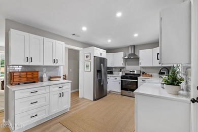 Completely renovated in 2024, this charming 3-bedroom, 2.5-bath - photo 9
