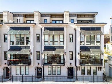 Absolutely fabulous end-unit townhome in the heart of the