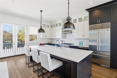 Absolutely fabulous end-unit townhome in the heart of the