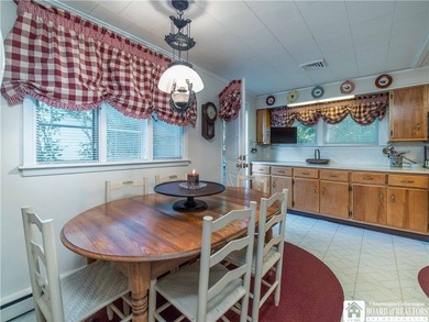 Welcome to 4896 Ashville Bay Road, a rare lakefront retreat on - photo 11
