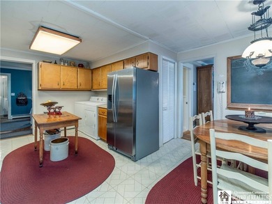 Welcome to 4896 Ashville Bay Road, a rare lakefront retreat on - photo 13