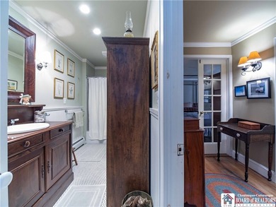 Welcome to 4896 Ashville Bay Road, a rare lakefront retreat on - photo 15