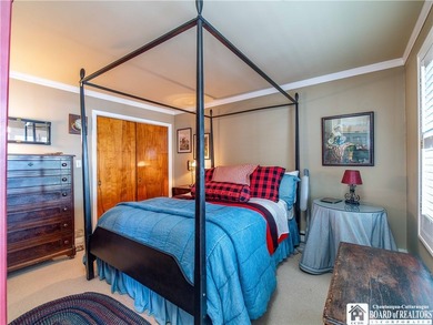 Welcome to 4896 Ashville Bay Road, a rare lakefront retreat on - photo 17